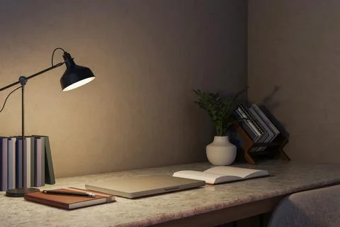 Closed laptop and open book and pencil under lamp light on marble counter t.. Stock Illustration