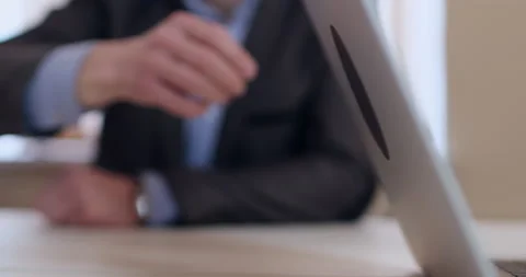 A closed lock is on the touchpad of an open laptop Video stock 146661145