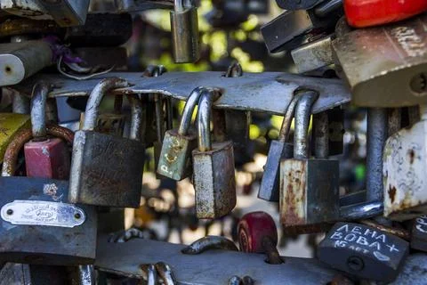 Closed love locks on the bridge Stock Photos