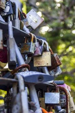 Closed love locks on the bridge Stock Photos