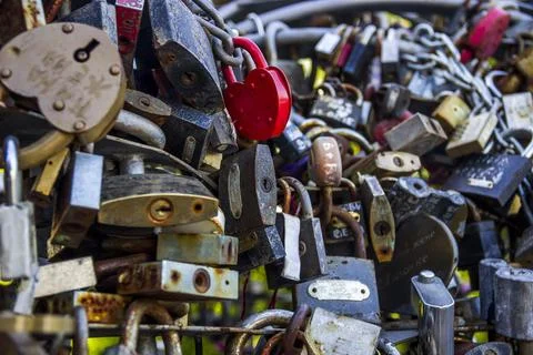 Closed love locks on the bridge Stock Photos
