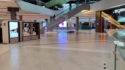 Closed mall on non-working days due to the Covid 19 pandemic. lockdown. The girl Stock Footage 164824126