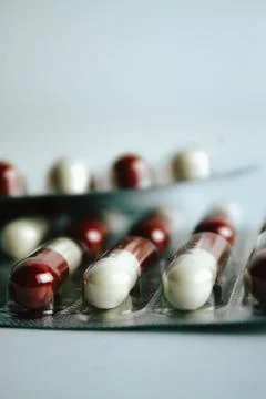 Closed medication blister. Medication and antibiotic. Blister of vitamins. Stock Photos