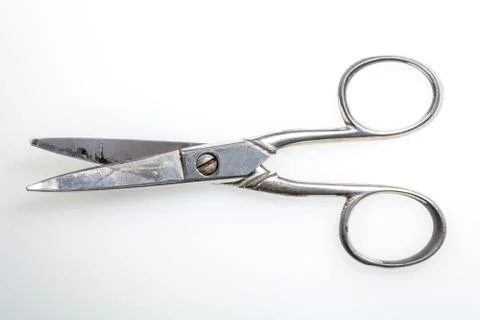 Closed metal scissors, on a white background Stock Photos