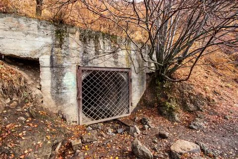 Closed mountain adit along the Old Japanese Road in the Big Almaty Gorge in Stock Photos