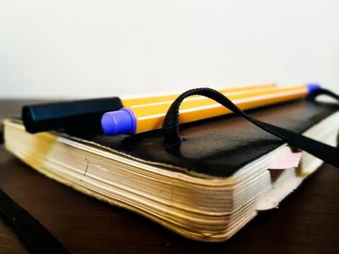 Closed Notebook and Pens Stock Photos