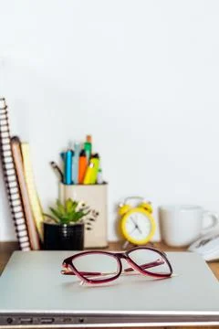 The closed notebook was placed on the desk in the room, Stock Photos