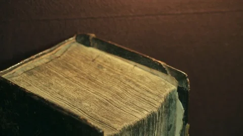 Closed old book in library Stock-Footage 75425954