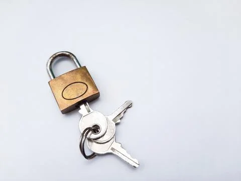 Closed padlock and key Stock Photos