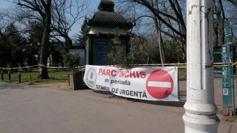 Closed Park with Caution Tape and Fence due to Coronavirus outbreak. Stock Footage 132279094