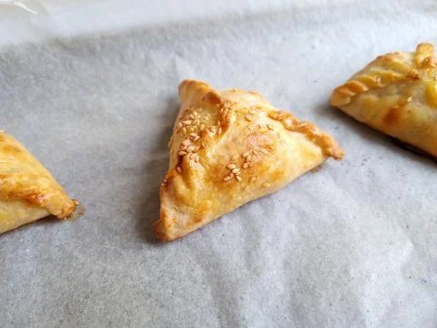 Closed pie with meat Stock Photos