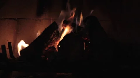 Closed plan of firewood burning in the fireplace. Hot Winter. Video stock 151467546