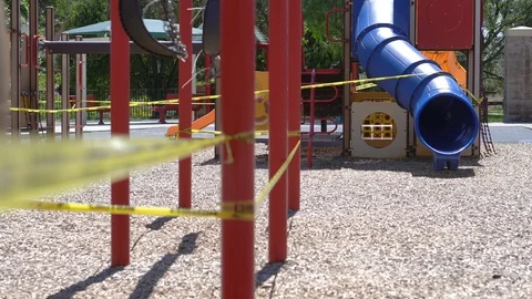 Closed Playground with Caution Tape Stock Footage 128277566