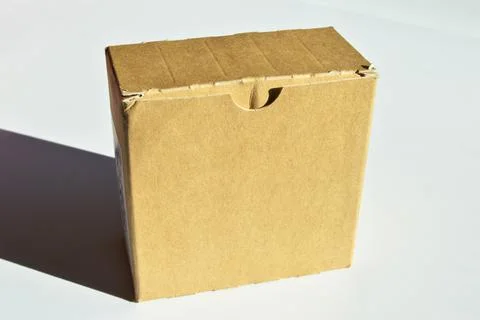 Closed rectangular cardboard box with corrugated cardboard Stock Photos