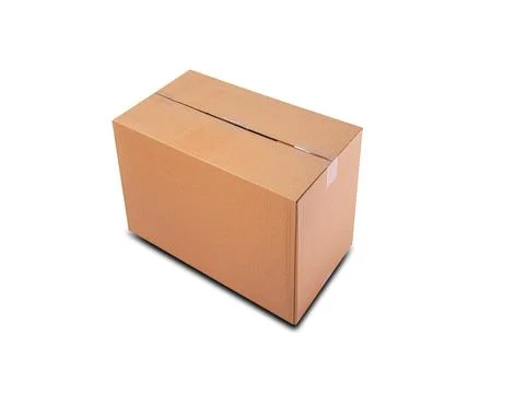 A closed rectangular cardboard shipping box sits sealed with transparent tape Stock Photos