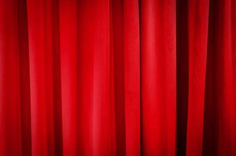 Closed red curtains as background or texture Stock Photos