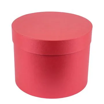 Closed red gift box, round shape made of cardboard Stock Photos