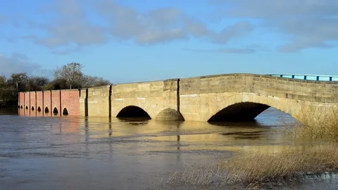 Closed road at bubwith bridge as the river derwent burst its banks uk Stock Footage 260178119