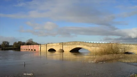 Closed road at bubwith bridge as the river derwent burst its banks uk Stock Footage 260313612