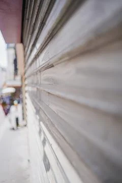 Closed Roller Shutter of a Shop Close Up Stock Photos