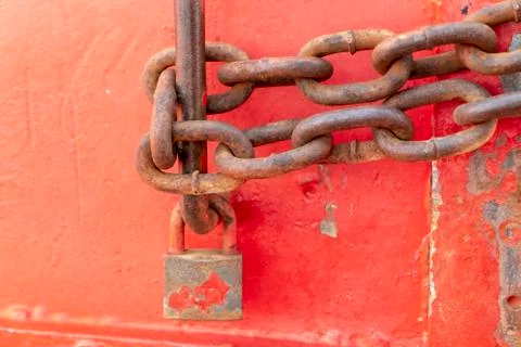 Closed rusty chain with old lock Stock Photos