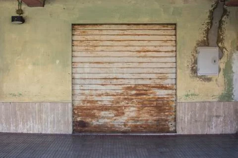 Closed rusty shutter Stock Photos