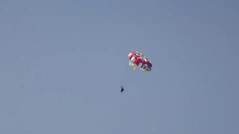 Closed shot of a person practicing parasailing Stock-Footage 225647023