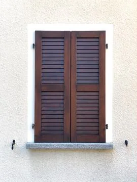 Closed shutter on clear wall Stock Photos