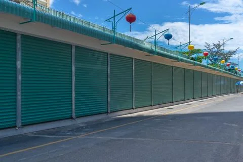 Closed shutters at the store front Stock Photos