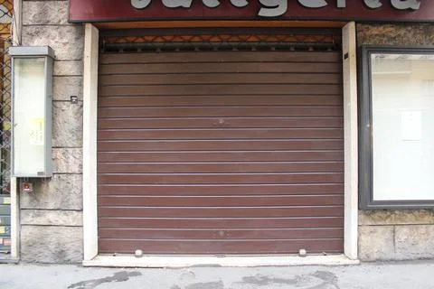 Closed shutters of a store Stock Photos