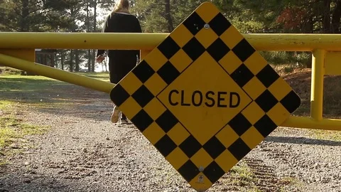 Closed sign in front of road Stock Footage 72229604