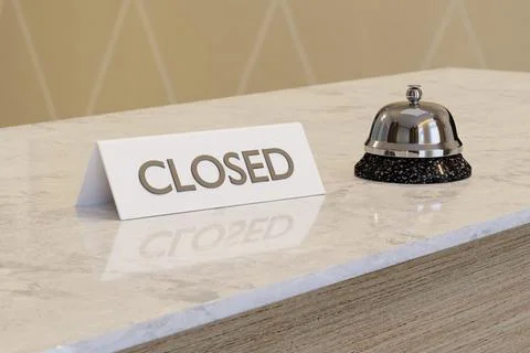 Closed sign on the white marble table of a hotel reception desk with a silve Stock Illustration