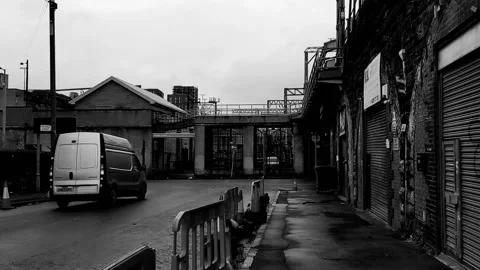 Closed stores under railway bridge Stock Footage 171799053