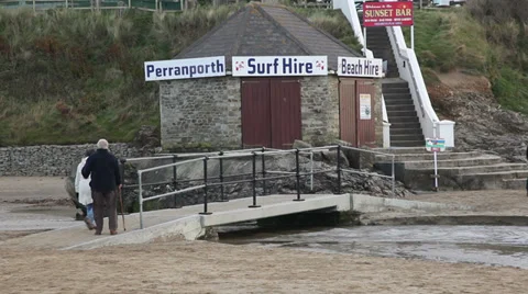 Closed surf hire shop on the beach Stock Footage 33957599