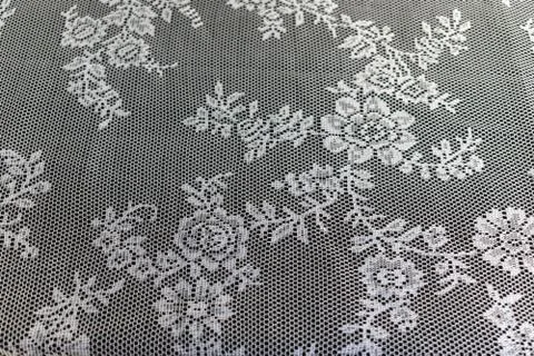 Closed up texture and pattern of a crochet tablecloth Stock Photos