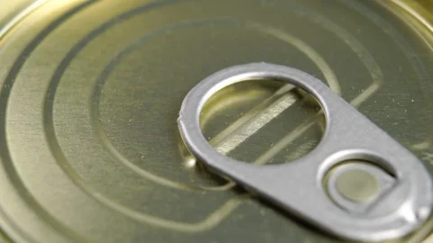 Closed tin can with pull ring. Conserved food metal container. Macro Video stock 165265104