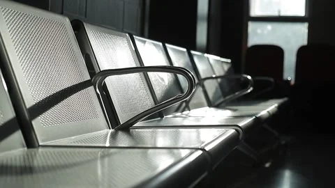 Closed view of chair row in modern hospital empty in waiting room Stock Footage 164216601