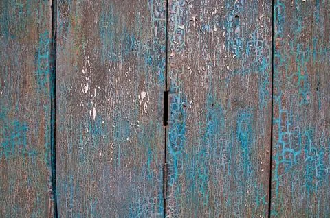 Closed up view of old dark cyan wooden closed door of a traditional house i.. Stock Photos