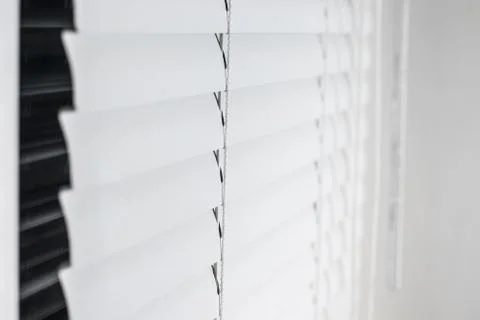 Closed white window blinds Stock Photos