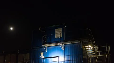 The closed window in a blue container Stock Photos
