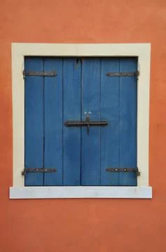 Closed window with blue shutter Stock-Fotos