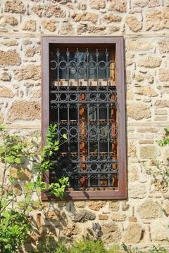 Closed window on the facade of the house Stock Photos