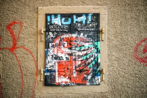 Closed window with graffiti Stock Photos
