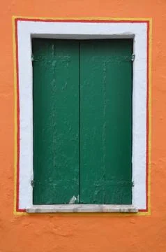 Closed window with green shutter Stock Photos