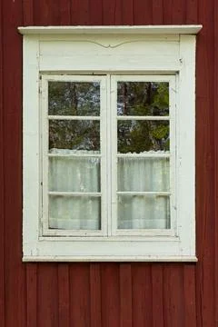 Closed window on wood wall. Stock Photos