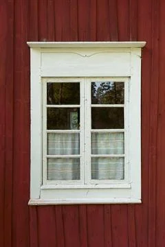 Closed window on wood wall. Stock Photos