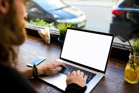 Closely man professional publication specialist working on portable laptop co Stock Photos
