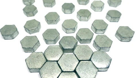 Closely packed metal hexagons become more dispersed. Stock Footage 331182788