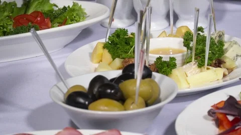 Closep of olives in the plate on the table Stock Footage 74091570