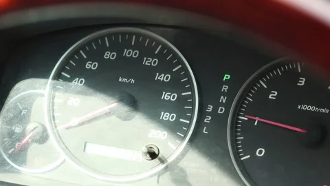 Closer up of a car dashboard with instruments like a speedometer, tachometer Stock Footage 321524524
